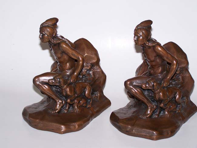 A stunning pair of Antique Bookends circa 1930 depicting an Indian with his dog — image 3
